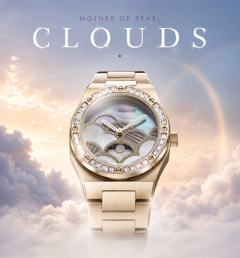 A gold-tone Valuchi watch with a mother-of-pearl dial and crystal-studded bezel, centered against a dreamy sky-and-cloud backdrop with the text 'MOTHER OF PEARL CLOUDS' above it.